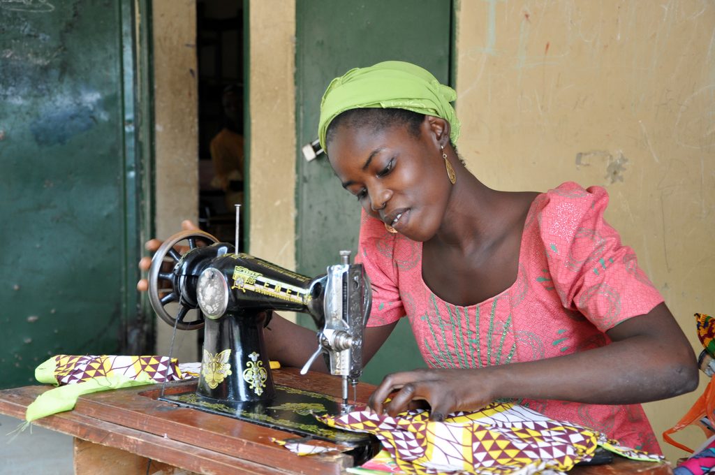 Girl learns tailoring skills at a training centre supported by Plan International. Investing in girls’ economic empowerment can transform lives, communities and entire countries. It is essential to achieving gender equality.